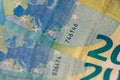 Selective focus on detail of EURO banknotes. Counting or giving EURO banknotes. World money concept, inflation and economy concept Royalty Free Stock Photo