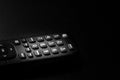 Selective focus, details of TV remote control buttons. Bucharest, Romania, 2021 Royalty Free Stock Photo