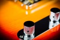 Selective focus of electric guitar volume knob on blurred background Royalty Free Stock Photo