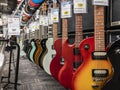 Lynnwood, WA USA - circa May 2022: Selective focus on electric guitars for sale inside a Guitar Center musical instrument store Royalty Free Stock Photo