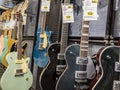 Lynnwood, WA USA - circa May 2022: Selective focus on electric guitars for sale inside a Guitar Center musical instrument store Royalty Free Stock Photo