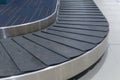 Selective focus, empty baggage carousel in airport hall Royalty Free Stock Photo