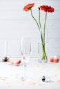 selective focus of empty glass with bouquet of gerbera flowers Royalty Free Stock Photo