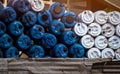 Selective focus on empty old chemical barrels. Blue and white oil drum. Plastic oil tank. Toxic waste warehouse. Hazard chemical Royalty Free Stock Photo