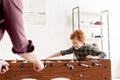 selective focus of father and cute smiling son playing table football together Royalty Free Stock Photo