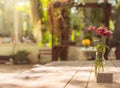 Selective focus flower glass vase on table vintage process style