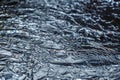 Selective focus on a fragment of crumpled aluminum foil Royalty Free Stock Photo