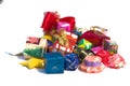 Selective focus gift boxes wrapped by colorful paper with isolated background. Closeup pile of present boxes.