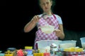 Selective focus. Girl  sifting flour adding baking ingredients. Home bakery Royalty Free Stock Photo