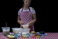 Selective focus. Girl  sifting flour adding baking ingredients. Home bakery Royalty Free Stock Photo