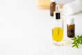 Selective focus on glass essential oil bottle, aromatherapy concept