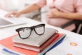 Selective focus of glasses lying on table in the office Royalty Free Stock Photo