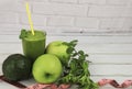 green juice healthy smoothies made from apples, spinach, avocado, salad, kiwi for a healthy detox diet concep