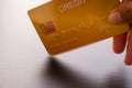 Selective focus Hand holding mock up golden credit card Royalty Free Stock Photo