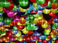 Selective focus on hand painted paper ball lanterns along main entrance street of KHON KAEN university in KHONKAEN province, THAIL