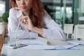 Selective focus on hands of business woman drinking water between break in office Royalty Free Stock Photo