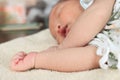 Selective focus on hands of cute newborn tiny Asian baby Royalty Free Stock Photo