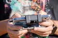 Selective focus, hands of a man operating a drone