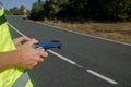 Selective focus, hands of a man operating a drone, technology concept