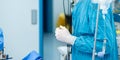 Selective focus on the hands of the surgeon in sterile gloves Royalty Free Stock Photo