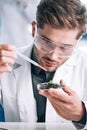 selective focus of handsome bearded biochemist Royalty Free Stock Photo