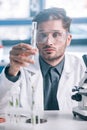 selective focus of handsome biochemist in Royalty Free Stock Photo
