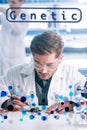 Selective focus of handsome biochemist in Royalty Free Stock Photo