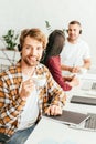 Selective focus of happy bearded broker Royalty Free Stock Photo