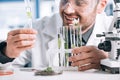 selective focus of happy biochemist looking Royalty Free Stock Photo