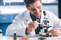 selective focus of happy biochemist with Royalty Free Stock Photo