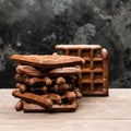 Selective focus on homemade fresh rye waffles on wooden table, d