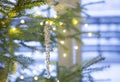 Selective focus on icicle shape Christmas ornament hanging on Christmas tree Royalty Free Stock Photo