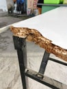 Broken corner of table. Royalty Free Stock Photo