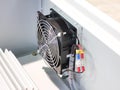 Selective focus image of exhaust fan in electrical panel. Royalty Free Stock Photo