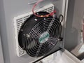 Selective focus image of exhaust fan in electrical panel. Royalty Free Stock Photo