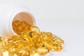 Selective focus image. Fish oil nutritional supplement capsules Royalty Free Stock Photo