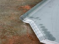 Selective focus image with noise effect fresh cut edge of iron sheet. Royalty Free Stock Photo