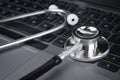 Selective focus image of stethoscope with laptop.Medical concept Royalty Free Stock Photo