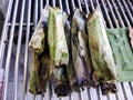 Indonesian specialties otak-otak pempek palembang are grilled over hot coals.