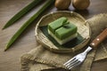 Selective focus of Kuih Seri Muka, traditional Malaysian two layered dessert with steamed glutinous rice forming the bottom half Royalty Free Stock Photo