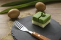 Selective focus of Kuih Seri Muka, traditional Malaysian two layered dessert with steamed glutinous rice forming the bottom half Royalty Free Stock Photo