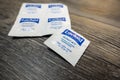 Seattle, WA USA - circa November 2022: Selective focus on Lactaid medicine on a wooden background Royalty Free Stock Photo