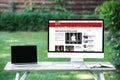 selective focus of laptop with blank screen computer with bbc news website Royalty Free Stock Photo