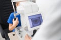 Selective focus of machine for checking eyesight in clinic