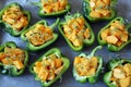 Green peppers stuffed with pumpkin. Selective focus. Macro.