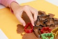 Selective focus. Making gingerbread cookies with various Christmas cookie cutters. Gingerbread dough. Family Christmas moments Royalty Free Stock Photo