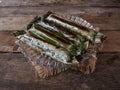 Selective focus. A Malay traditional dessert called Pulut Panggang on wooden background Royalty Free Stock Photo