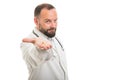 Selective focus of male doctor handing one pill