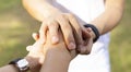 Selective focus of Man hand which Lending a helping hand as trust together with each other ,compassion concept