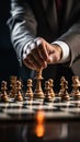 Selective focus Mans hand in chess play, metaphorically guiding strategic business decisions